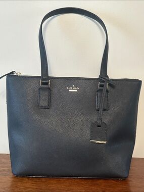 kate spade black leather tote with gold logo